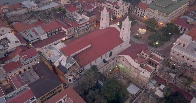 twilight aerial rear view of a spanish colonial church located in a historical site named casco antiguo in panama