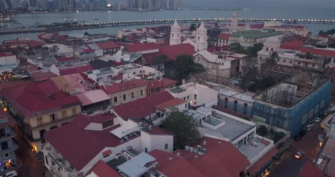 twilight aerial view of a spanish colonial town located in a historical site named casco antiguo in panama.