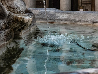 Fototapeta na wymiar Detail of waterfall in the Fountain of Pantheon in Rome