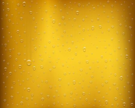 Drops of condensate on a glass with beer or juice.