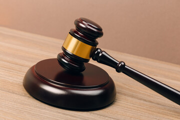 Symbol of law and justice on wooden table in lawyer office