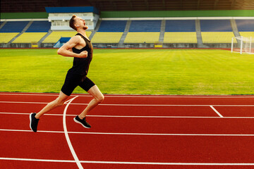 Fototapeta premium Happy athlete won the stadium race. Sport winner 