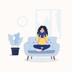 Women sitting on the couch and reading book. Girls study at home.