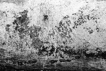 Texture of a concrete wall with cracks and scratches which can be used as a background