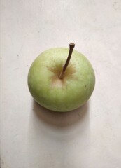 apple on a wooden table