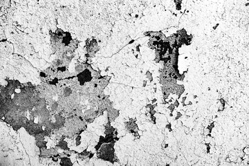 Texture of a concrete wall with cracks and scratches which can be used as a background