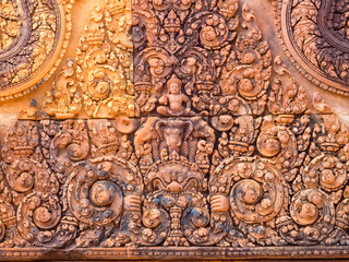A wall of the 'Citadel of the Women' covered with beautifully carved ornamentation - Banteay Srei, Cambodia