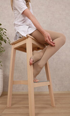 Varicose veins prevention, Compression tights, relief for tired legs. Beautiful long female legs in...