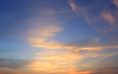 Fototapeta na wymiar Abstract blue-orange clouds at sunset sky background. Panorama style background