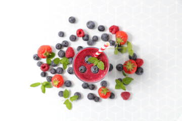 Naklejka na ściany i meble blueberry and strawberry smoothie- top view