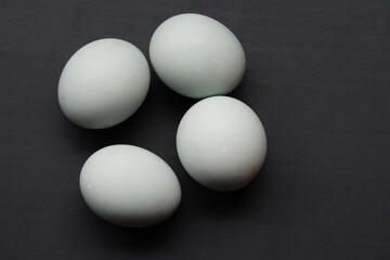 A salted duck egg on black isolated background