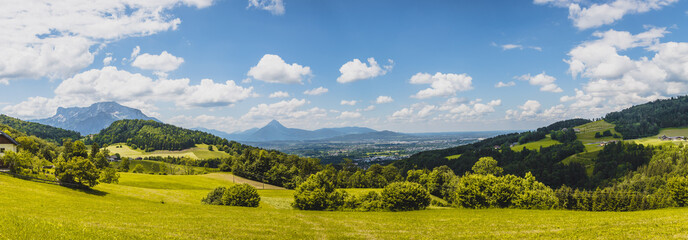 Hiking holiday near Salzburg: Gaisberg landscape panorama in summer, idyllic meadow and blue sky - obrazy, fototapety, plakaty