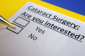 Obraz premium One person is answering question about cataract surgery.