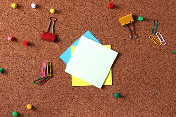 rustic brown natural cork board with stationary and stick up notes representing different issues