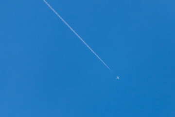 Plane in the blue sky