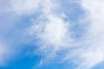 White clouds on a blue sky as background
