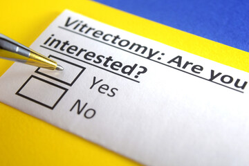 Obraz premium One person is answering question about vitrectomy.