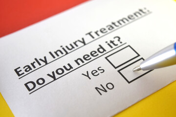 Fototapeta premium One person is answering question about early injury treatment.