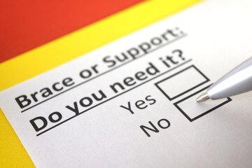 One person is answering question about brace or support.