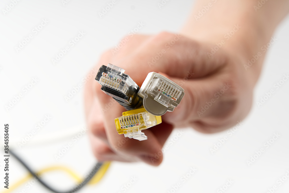 Aufkleber lan wires cat5 cat6. hand holds wires with high speed internet access. internet technologies of the 