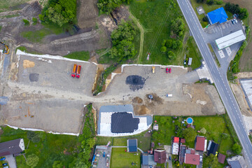 CZECH, FRYDEK MISTEK 01.06.2020 Road Construction Site near the highway with machinery, bulldozer, excavation from above. 4K video, top down view.