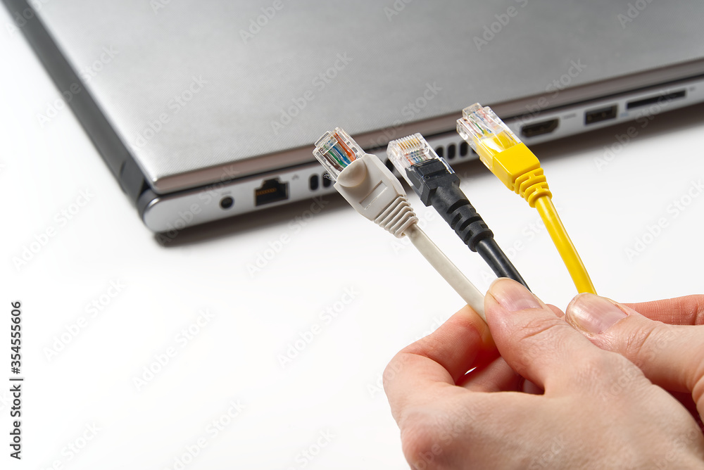 Aufkleber lan wires cat5 cat6. hand holds wires with high speed internet access. internet technologies of the 