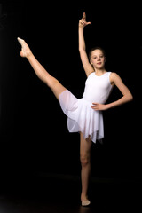 Obraz premium Full length portrait of a charming gymnast girl in elegant dress.