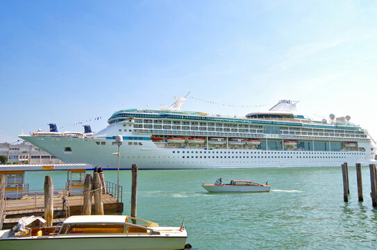 Royal Caribbean cruiseship or cruise ship liner MS Rhapsody of the Seas at terminal in port of Venice, Italy ready for Mediterranean cruising during summer	