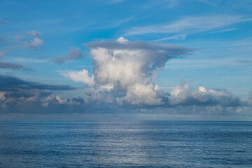 Naklejka na ściany i meble Cloud formation over a calm sea. Aldeburgh, Suffolk. UK.