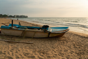 Fishing boat on ocean sand beach, Sri Lanka, Colombo