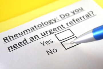 Fototapeta premium One person is answering question about rheumatology.