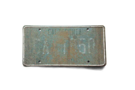 Old license plate isolated on white background