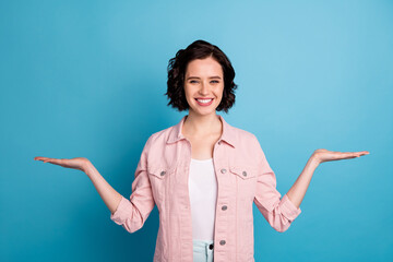 Photo of beautiful pretty lady short black hairdo hold open palms arms demonstrate advising two...