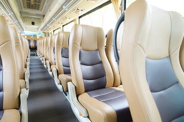 Comfortable passenger bus interior. Close-up of the rear seats, interior. Interior of modern mini...