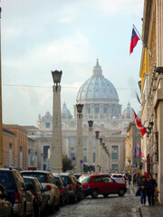 Sistine Chapel and St. Peter´s Square with old historic buildings and columns in Rome, Italy