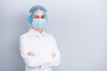 Photo of confident professional virologist doctor lady arms crossed good mood sterile clean uniform...