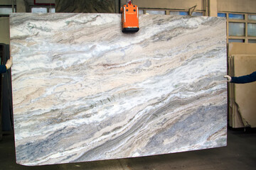Displaying a Colorful marble slab in the store's showroom before selling