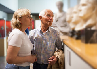 Man and woman visiting museum