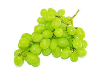 Extraordinarily sweet grapes with yellow green fruits on a white background