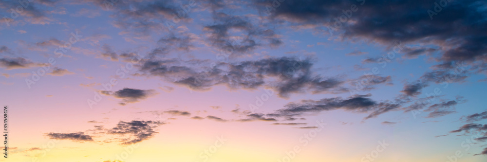 Wall mural colorful sky with clouds at sunset, nature panoramic background