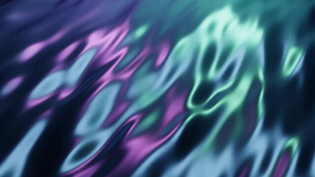 Iridescent oil slick background backdrop. Seamless looping animation. Dark blue and purple sheen. Very relaxing and calming color display waves.