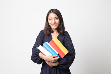 Young Asian woman studying  with may books.