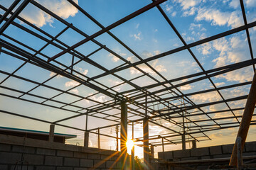 Structural steel roof using steel frames of building residential at evening