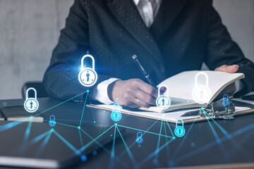 Lock icons hologram and a woman taking notes. Business security and protection concept. Multiexposure.