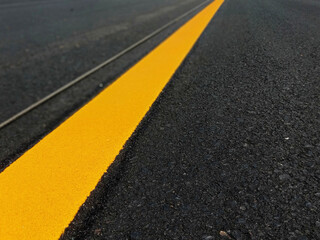 Fototapeta premium Yellow traffic line in Thailand