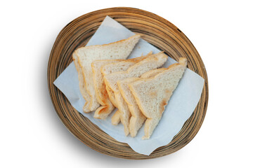 Sliced bread toast on basket isolated on white background with clipping path, top view