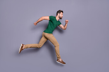 Full size profile side photo of anxious guy jump run fast afraid miss spring season discounts wear...