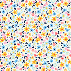 Simple cute pattern in small colorful flowers on white background. Liberty style. Ditsy print. Floral seamless background. The elegant the template for fashion prints.