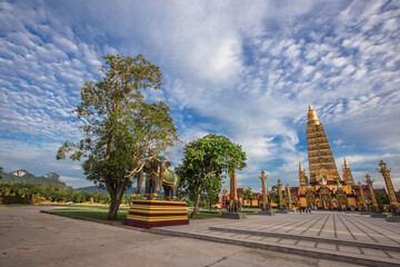 The beautiful sculpture background of, Wat Bang Thong, surrounded by trees, has a large area, is a religious tourist attraction in Krabi, with tourists always visiting, Thailand