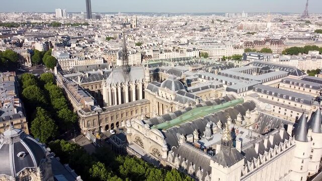 Aerial backward of Ile de la Cit&egrave; in Paris and cityscape panoramic view